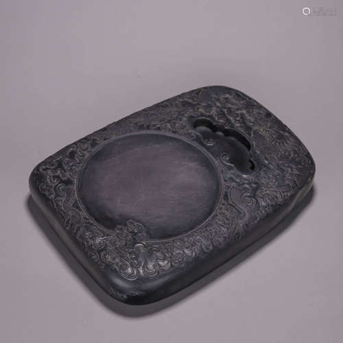 An inscribed cloud and dragon inkstone