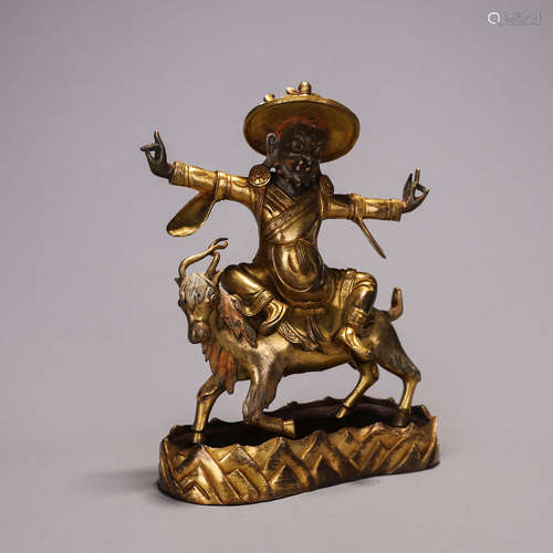 A gilding copper buddha statue