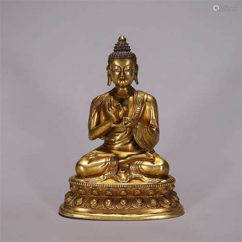 A gilding copper Sakyamuni buddha statue