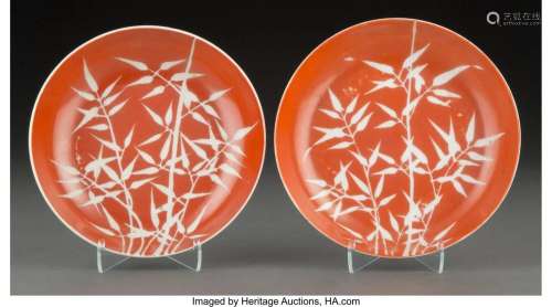 A Pair of Coral Ground Reverse-Decorated Porcela