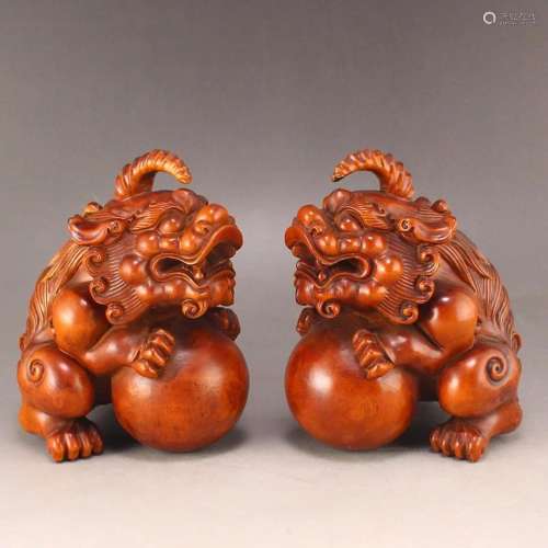 A Pair Chinese Boxwood Wood Carved Unicorn Statues