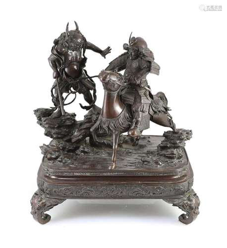 An impressive Japanese bronze group of an oni attacking a Sa...