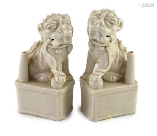 A pair of Chinese blanc-de-chine Buddhist lion joss stick ho...