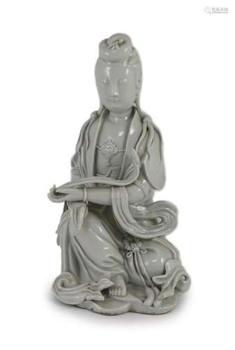 A Chinese blanc-de-chine seated figure of Guanyin, Dehua kil...