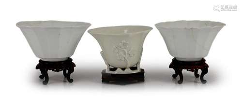 A pair of Chinese blanc-de-chine fluted bowls and a similar ...