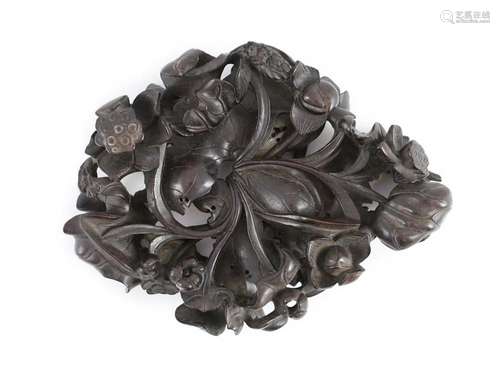 A fine Chinese carved zitan ‘lotus’ stand, Qing dynasty, 14....