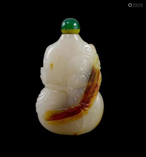 A Chinese white and russet jade snuff bottle, 19th century, ...