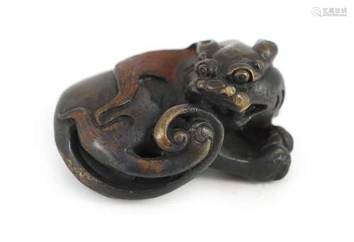 A Chinese bronze ‘lion dog’ scroll weight, Ming or later, 6....