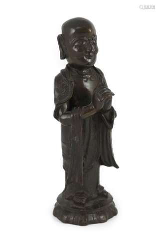 A Chinese Ming bronze figure of a luohan, 17th century, 21cm...