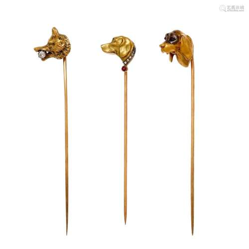 Three tie pins in the shape of dog heads, late 19th Century ...
