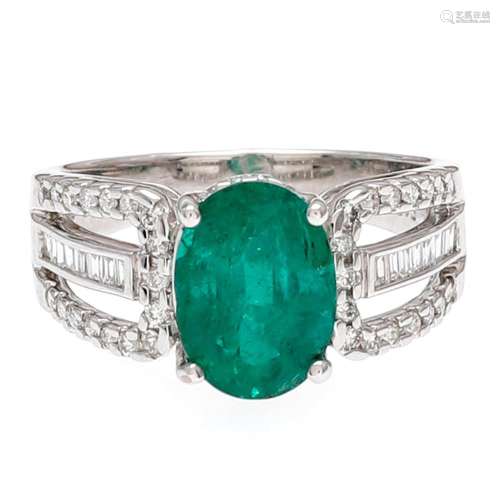 Emerald and diamonds ring.