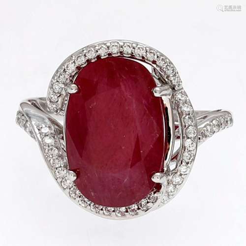 Ruby ring bordered with diamonds.