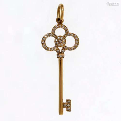 TIFFANY & CO. Pendant in the shape of a Crown key.