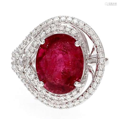 Tourmaline ring bordered d with diamonds.