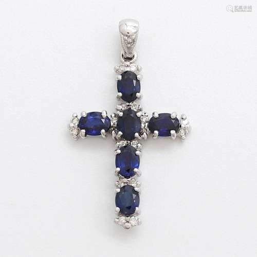 Sapphires and diamonds pendant cross.