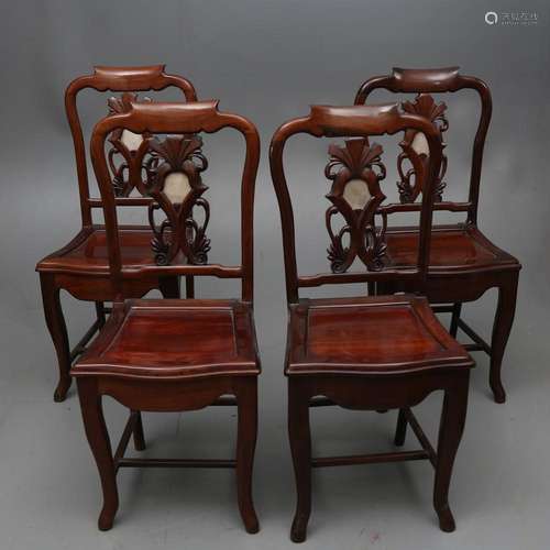 Set of four Chinese or Filipino chairs in huangmu wood, late...