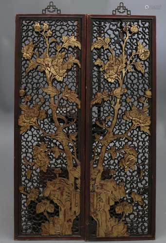 Pair of Vietnamese panels in carved, openwork and gilt Orien...