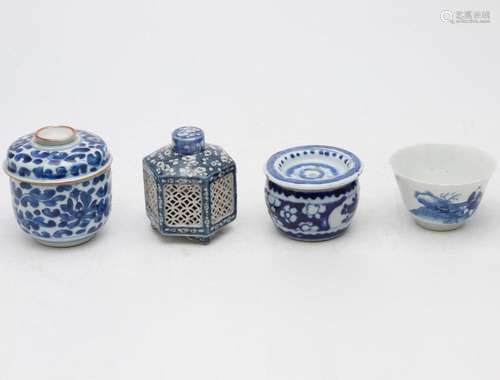 Three Chinese bowls and openwork pot in blue and white porce...