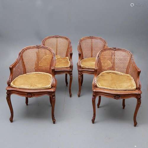 Set of four Louis XV style "canné" armchairs in ca...