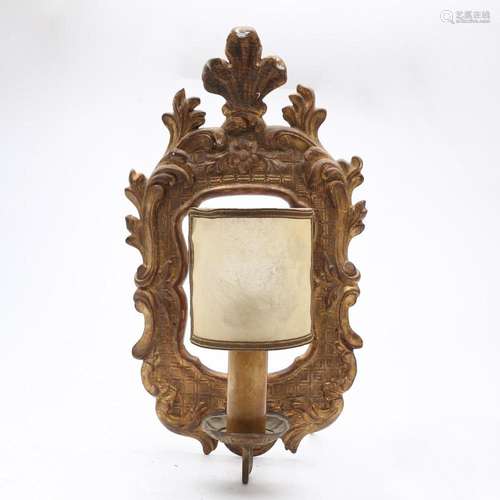 18th Century-style ornamental mirror in carved and gilt wood...