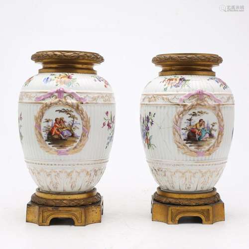 Pair of German porcelain vases with bronze mounts, early dec...