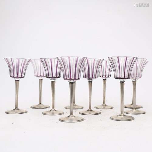 Set of ten Art Deco goblets in carved and bent glass and sil...