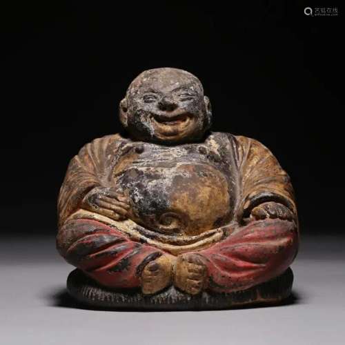 A Pottery Seated Budai