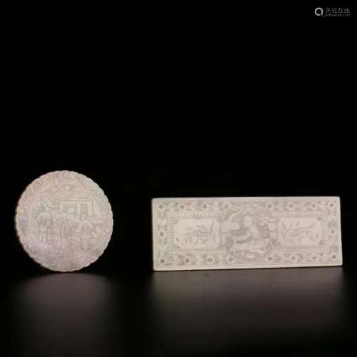 Two Incised Mother of Pearl Jettons
