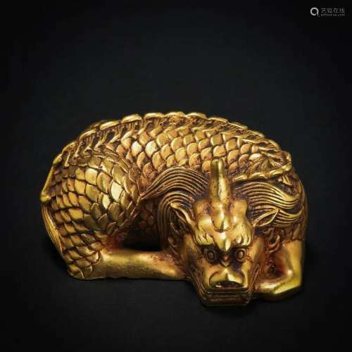 A Chinese Bronze-gilt Beast Shaped Paper Weight