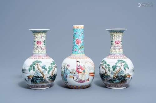 A PAIR OF CHINESE BOTTLE SHAPED FAMILLE ROSE VASES WITH AN A...