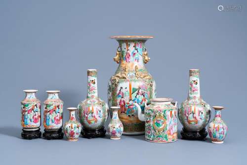 EIGHT CHINESE CANTON FAMILLE ROSE VASES AND A TEAPOT AND COV...