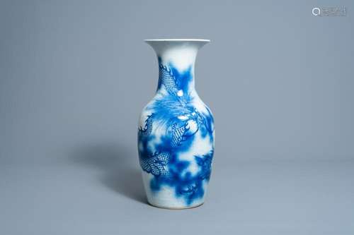 A CHINESE BLUE AND WHITE 'DRAGONS CHASING THE PEARL'...