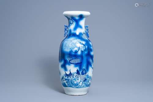 A CHINESE BLUE AND WHITE 'DRAGON AND CARP' VASE, 19T...