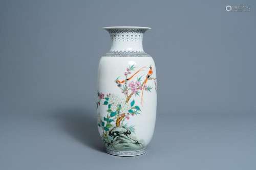 A CHINESE FAMILLE ROSE VASE WITH BIRDS AMONG BLOSSOMING BRAN...