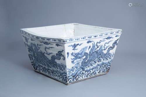 A LARGE CHINESE BLUE AND WHITE SQUARE 'SEA DRAGON' J...