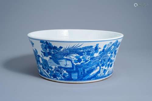 A LARGE CHINESE BLUE AND WHITE BASIN WITH PHEASANTS IN A LAN...