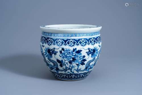 A CHINESE BLUE AND WHITE 'DRAGONS' JARDINIÈRE, 19TH ...