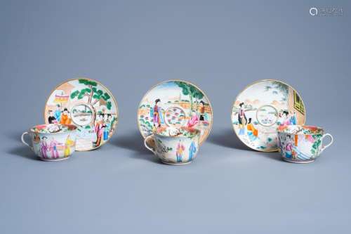 THREE CHINESE CANTON FAMILLE ROSE CUPS AND SAUCERS WITH FIGU...