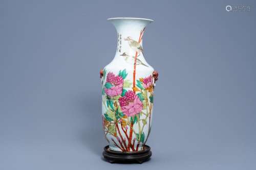 A CHINESE QIANJIANG CAI VASE WITH BIRDS AMONG BLOSSOMING BRA...