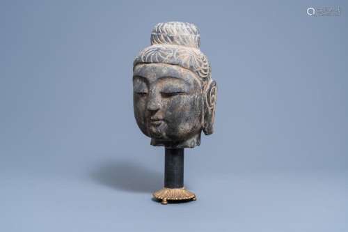 A CHINESE STONE HEAD OF BUDDHA, MING OR LATER