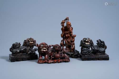 FOUR CHINESE CARVED WOOD FIGURES OF SHOU LAO AND BUDDHIST LI...