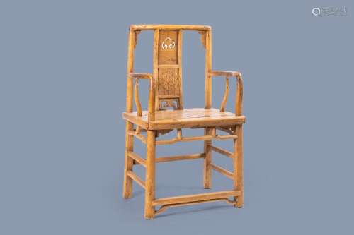 A CHINESE ELMWOOD CHAIR WITH CARVED AND RETICULATED PANELS, ...