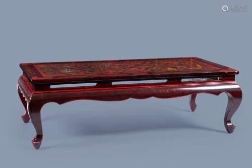 A CHINESE RED-LACQUERED WOOD 'DRAGON AND PHOENIX' TA...