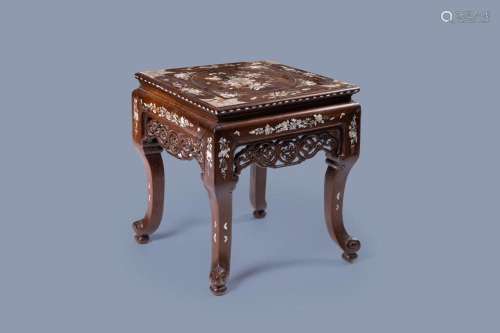 A VIETNAMESE OR CHINESE WOOD STAND INLAID WITH MOTHER-OF-PEA...