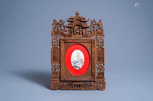 A FINELY CARVED CHINESE WOOD FRAME WITH RICE PAPER PAINTING,...