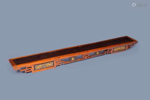 A LONG CHINESE GILT AND LACQUERED WOOD RETICULATED CONSOLE T...