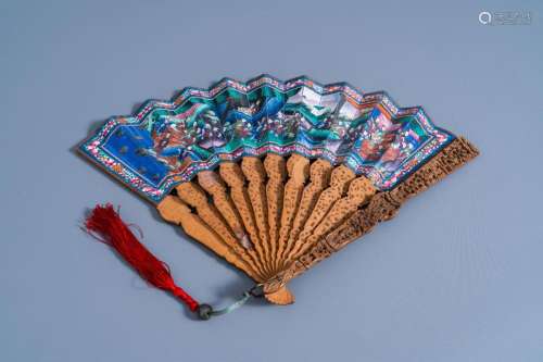 A CHINESE PAINTED PAPER AND WOOD FAN WITH A PALACE SCENE, CA...