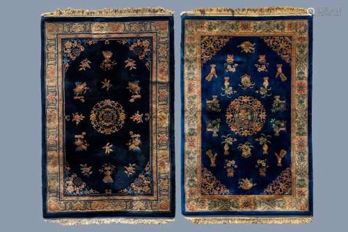 TWO CHINESE WOOLEN 'BEIJING' CARPETS WITH ANTIQUITIE...