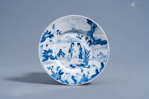 A CHINESE BLUE AND WHITE PLATE WITH FIGURES IN A LANDSCAPE, ...