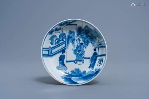 A CHINESE BLUE AND WHITE SAUCER WITH A KNEELING LADY WITH A ...